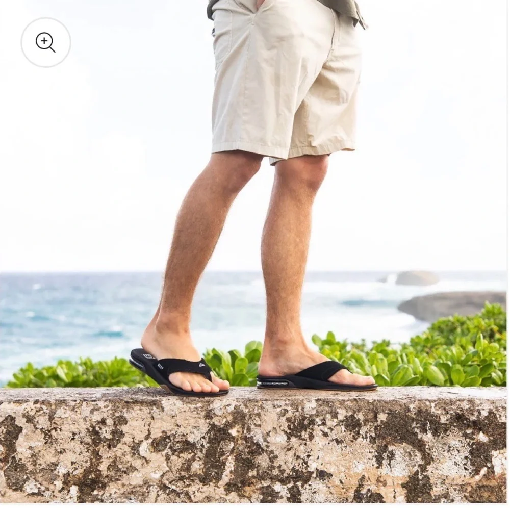 Reef Black and Silver Fanning Flip-Flop with Bottle Opener